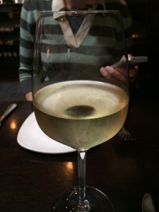 Glass of wine at SPQR, Piemonte white wine